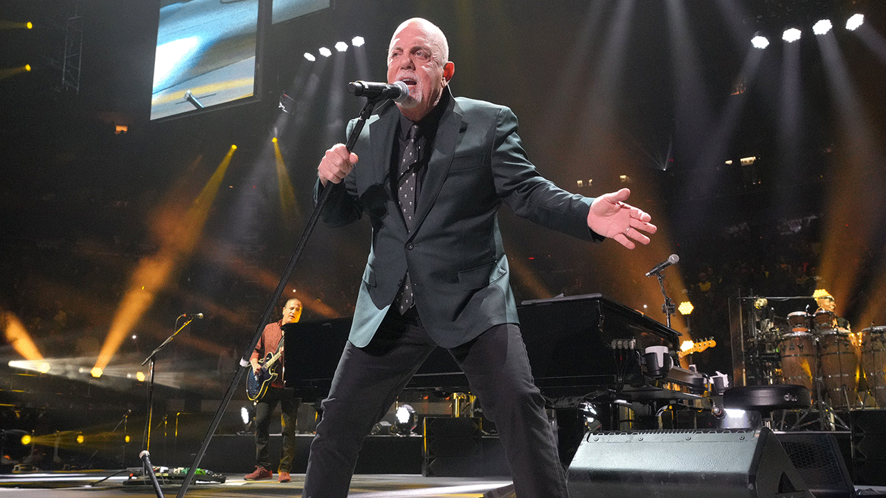 Billy Joel performing in the Madison Square Garden